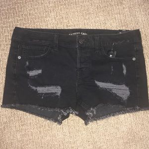 Black distressed low rise jean shorts